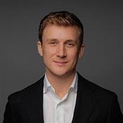 Photo of Tom Burgess, a speaker at Experience Transformation 2025